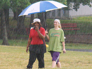 Nothing like a walk through the pouring rain for these fans!