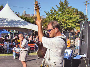 Jim Young on Bass guitar - Oracle Band's newest member. Click for enlarged view